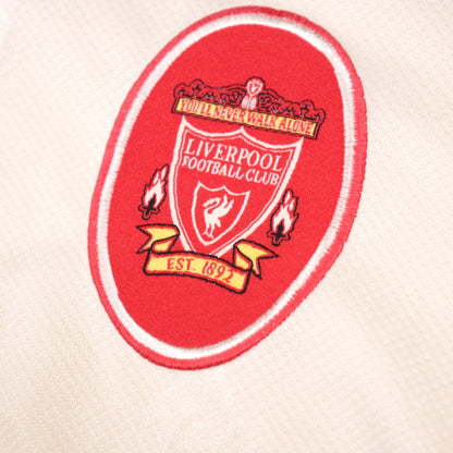 Close-up of the Liverpool Football Club crest with 'You'll Never Walk Alone' detailing