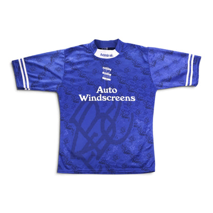 Front of blue Birmingham City home shirt with Auto Windscreens sponsor and crest