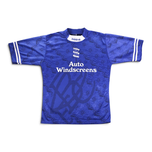 Front of blue Birmingham City home shirt with Auto Windscreens sponsor and crest