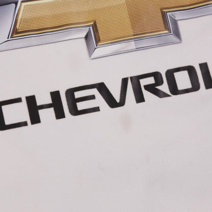 Close-up of the Chevrolet sponsor print on the chest
