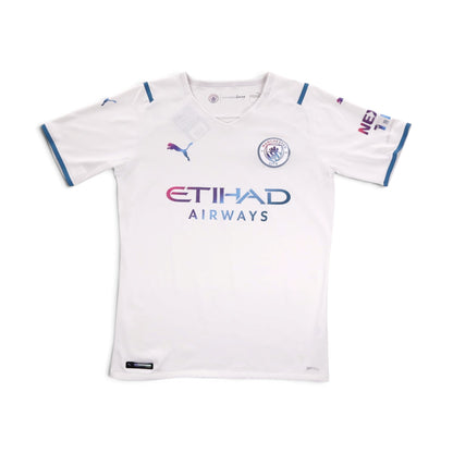 Front of white Manchester City 2021/22 away shirt by Puma with Etihad Airways sponsor