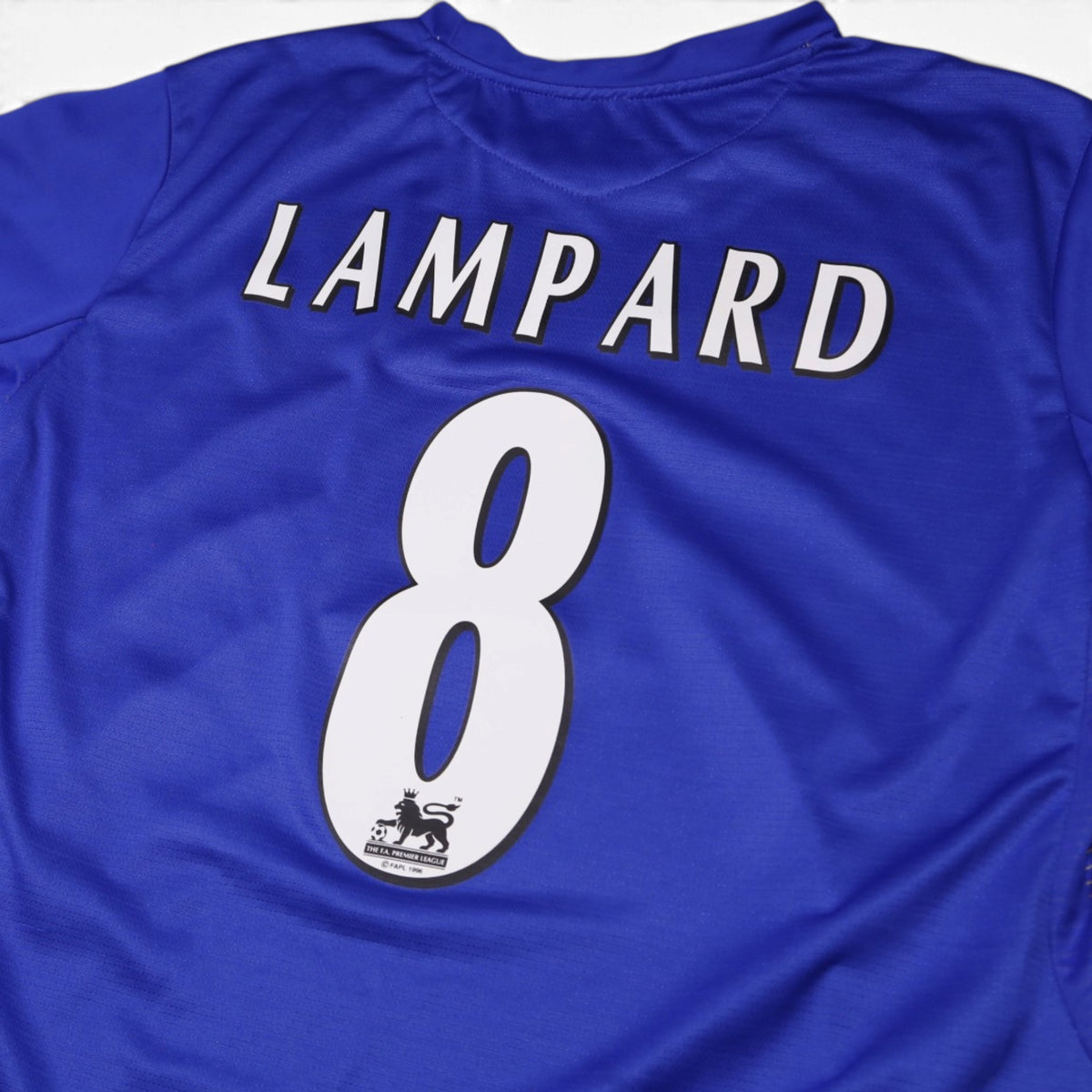 Close-up of Lampard 8 name and number print with Premier League badge