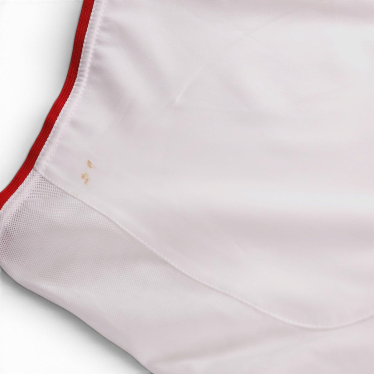 Close-up of the hem showing small marks