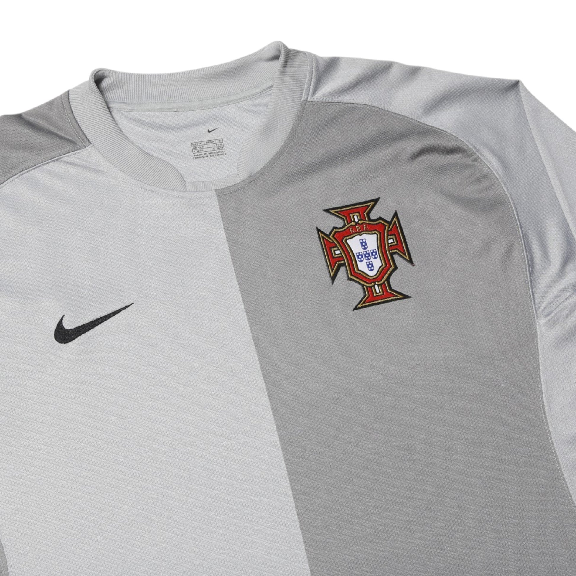 Close-up of Portugal crest and Nike logo on goalkeeper shirt