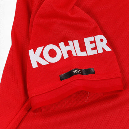 Close-up of Kohler sleeve print and '90+1' mark on the cuff
