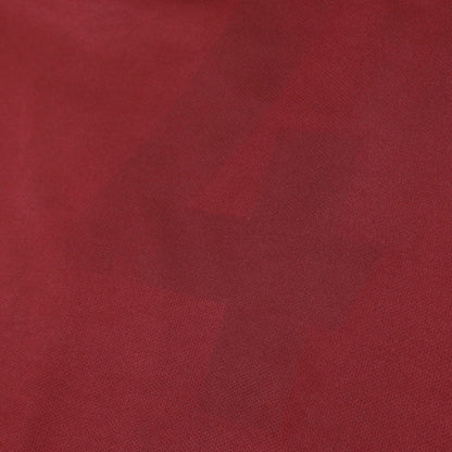 Close-up of the claret fabric texture on the West Ham United shirt