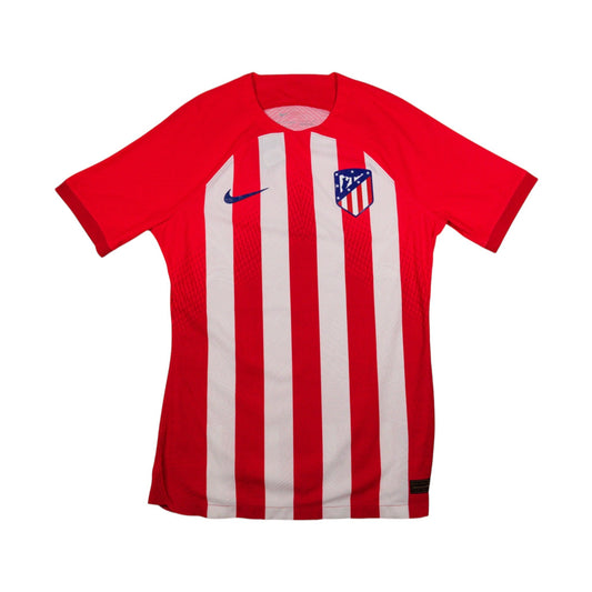 Atletico Madrid 2023/24 home shirt, front view with red and white vertical stripes