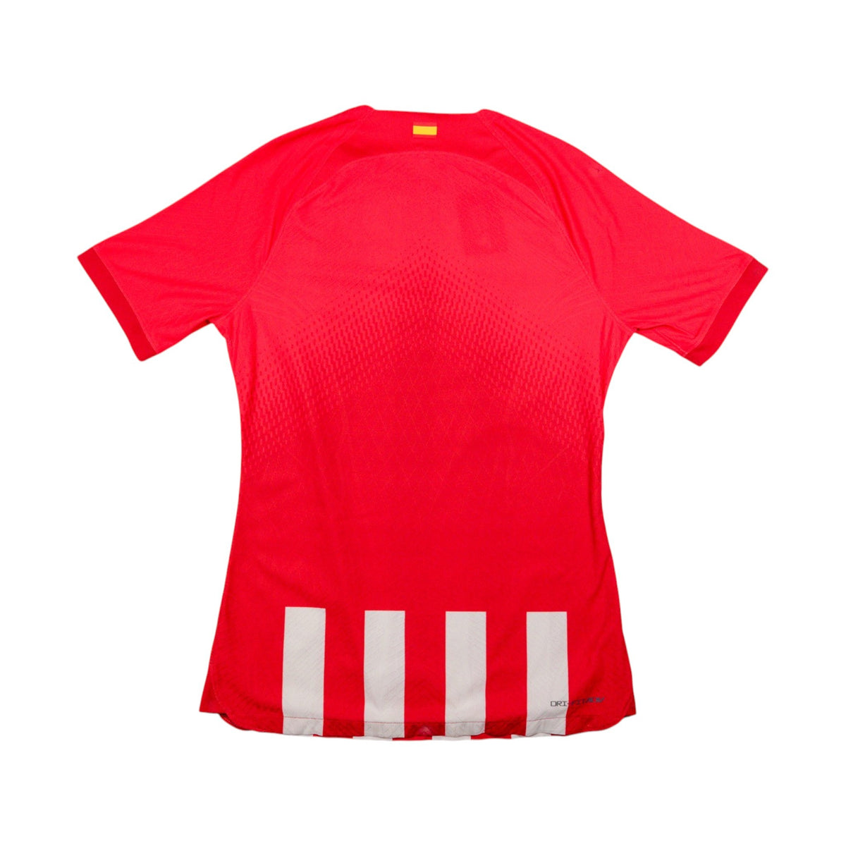 Atletico Madrid 2023/24 home shirt, back view showing plain red back and white hem stripes
