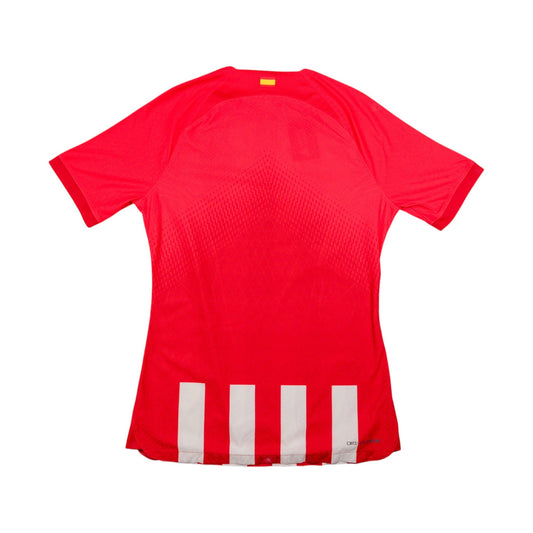Atletico Madrid 2023/24 home shirt, back view showing plain red back and white hem stripes
