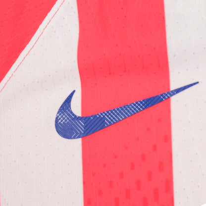 Close-up of the Nike swoosh on the chest fabric