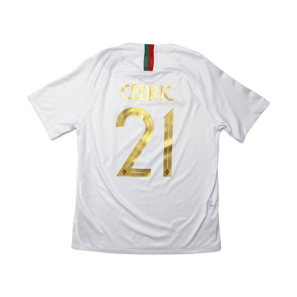Back of 2018/19 Portugal away shirt showing Cedric #21 printed in gold lettering