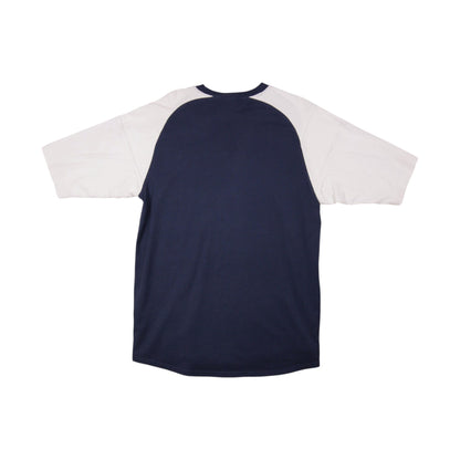 Back view of navy Manchester United Nike training shirt