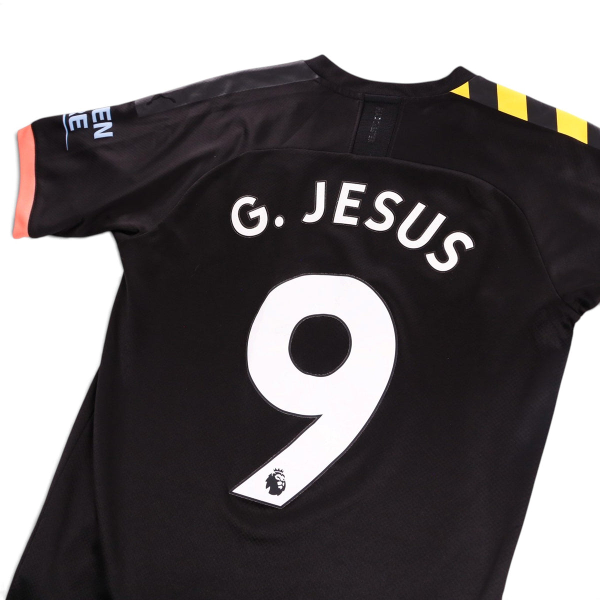 Close-up of the G. Jesus number 9 print and Premier League badge on the back