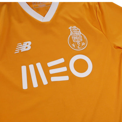 Close-up of FC Porto away shirt showing New Balance logo, crest and MEO sponsor