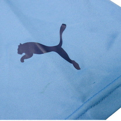 Close-up of the Puma logo on the sleeve of the Lazio shirt
