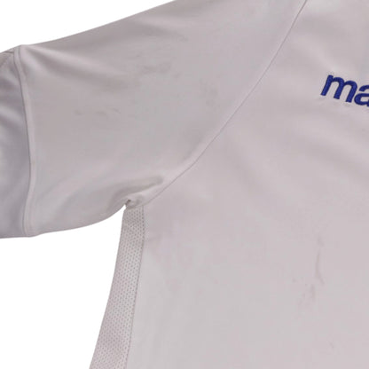 Close-up of shoulder seam and mesh side panel showing faint marks