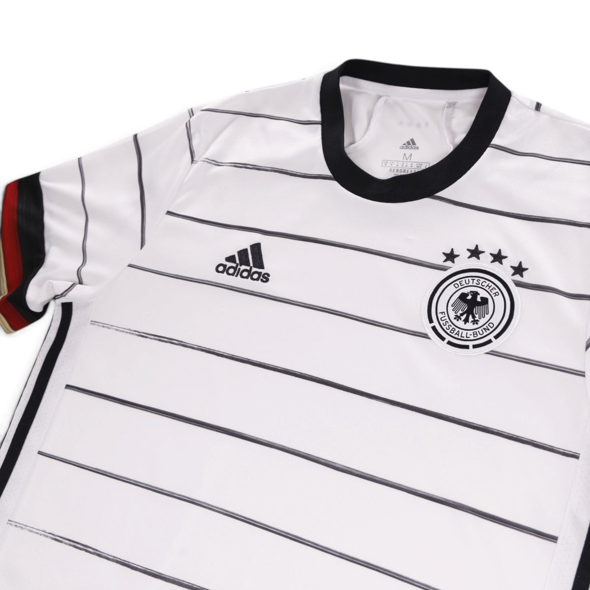 Close-up of adidas neck label, DFB crest and chest branding on Germany home shirt