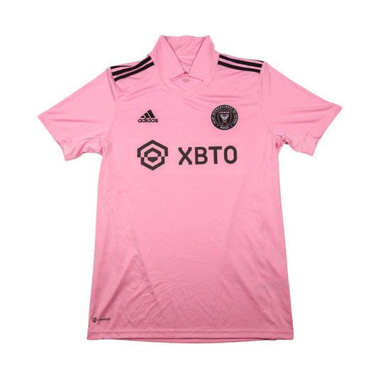 Front of 2023/24 Inter Miami CF pink home shirt with XBTO sponsor and adidas logo
