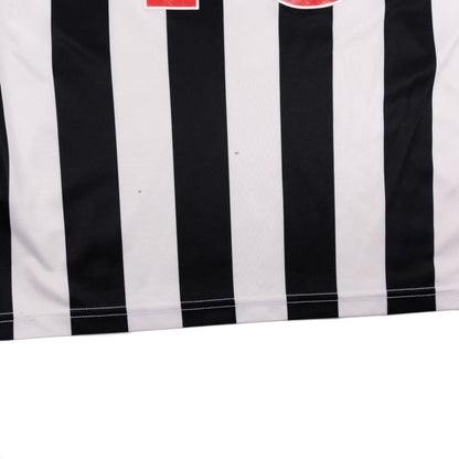 Close-up of the front hem showing small marks on the fabric