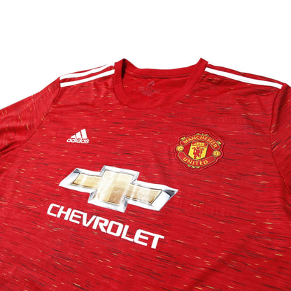 Manchester United 2020/21 home shirt front detail showing crest, adidas logo, and Chevrolet branding