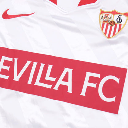 Close-up of Sevilla crest, Nike logo and Sevilla FC chest graphic