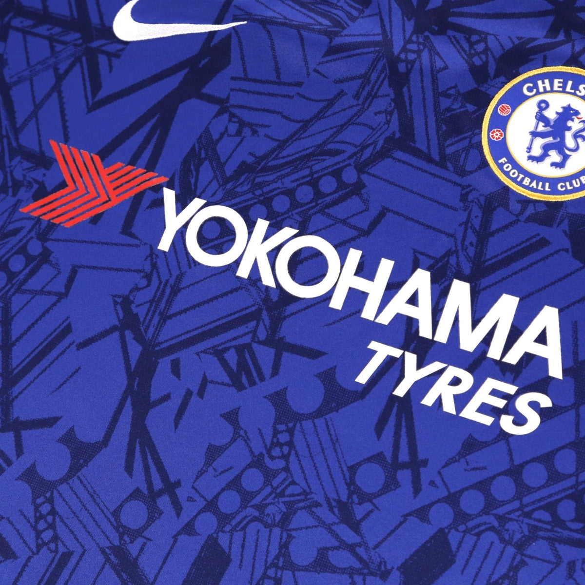 Close-up of Chelsea crest, Nike swoosh and Yokohama Tyres sponsor on the chest