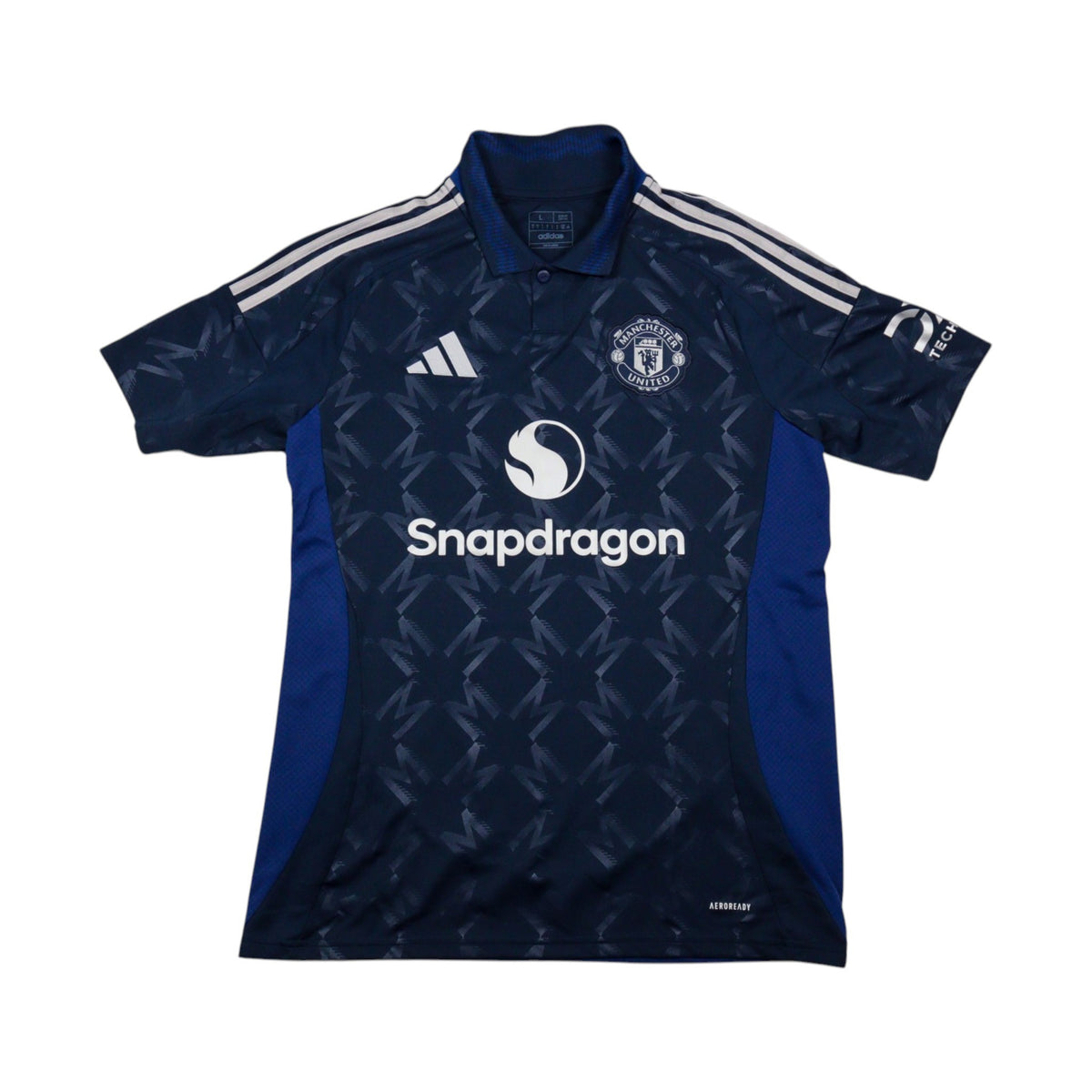 Manchester United 2024/25 away shirt front view with Snapdragon sponsor and adidas crest