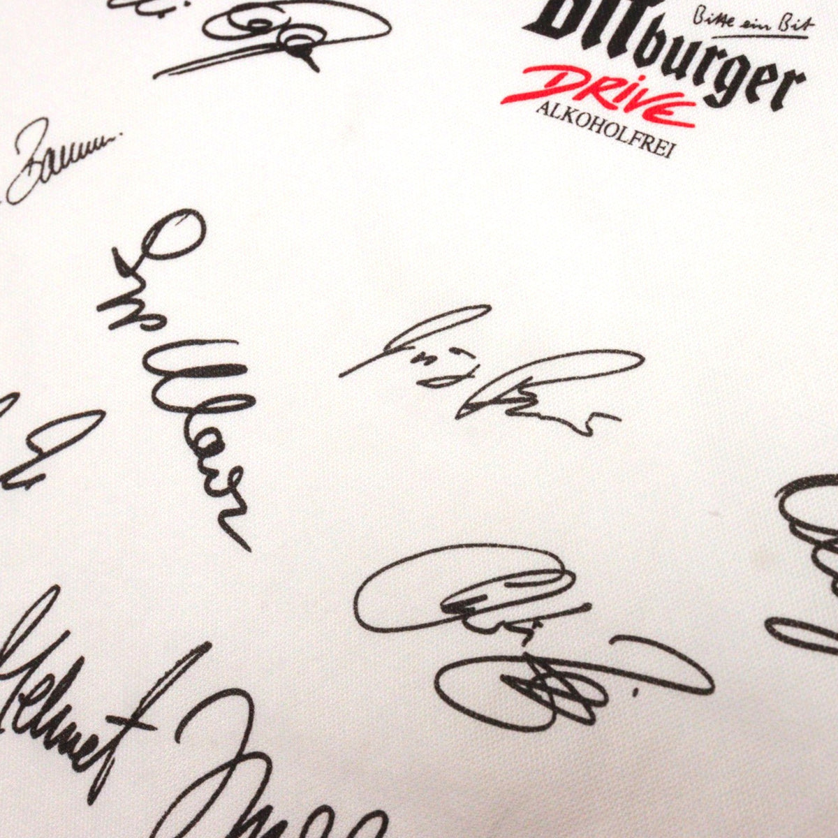 Close-up of signatures on the Germany shirt