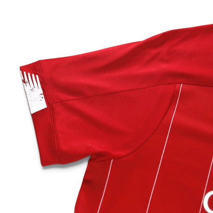 Close-up of the sleeve cuff and shoulder seam from the back