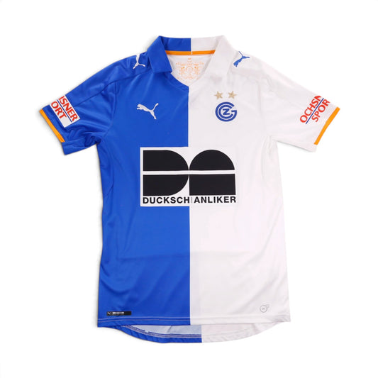 Front of 2016/17 Grasshopper Club Zurich home shirt by Puma, blue and white split design