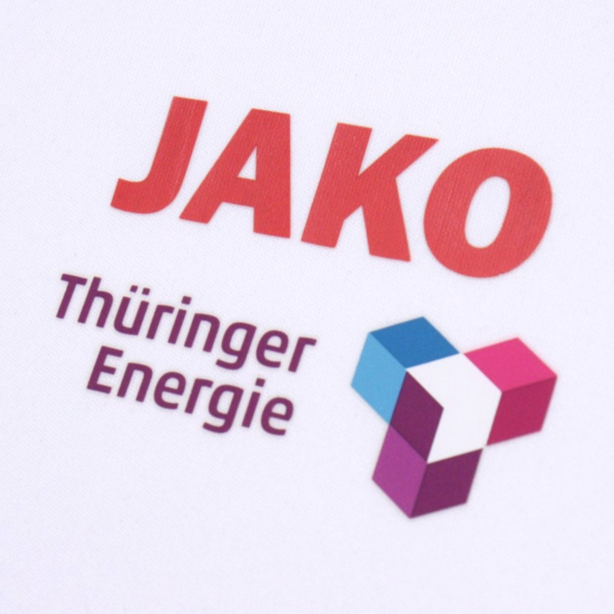 Close-up of the JAKO and Thüringer Energie sponsor logos on the chest