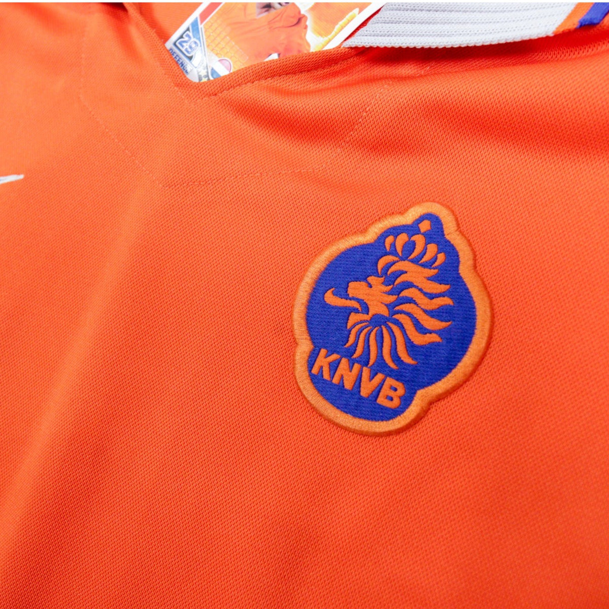 Close-up of the embroidered KNVB crest on the Netherlands home shirt