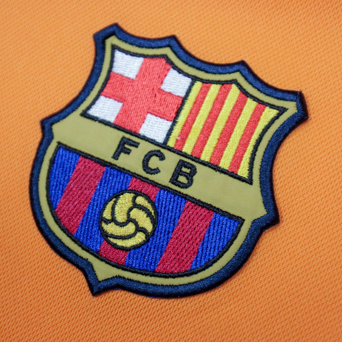 Close-up of the Barcelona crest on the chest
