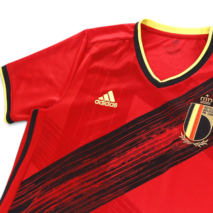 Close-up of adidas logo, crest, collar and neck label reading size M