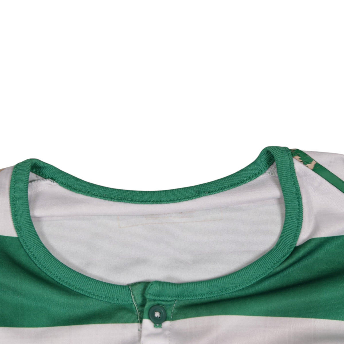 Close-up of the crew neck and button placket on the Celtic shirt