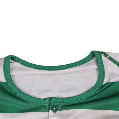 Close-up of the crew neck and button placket on the Celtic shirt