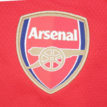 Close-up of embroidered Arsenal crest