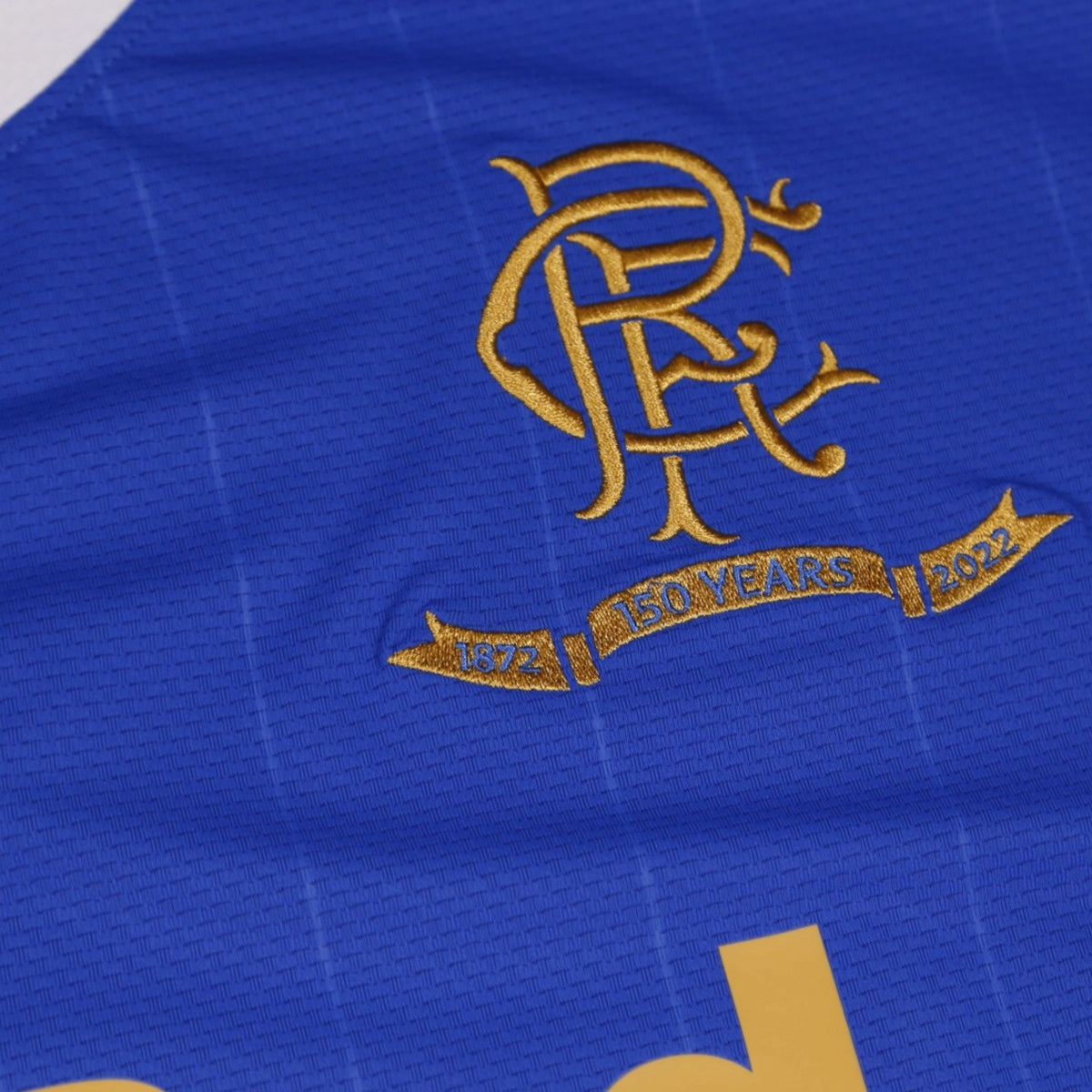 Close-up of Rangers crest with 150 Years 1872-2022 anniversary ribbon