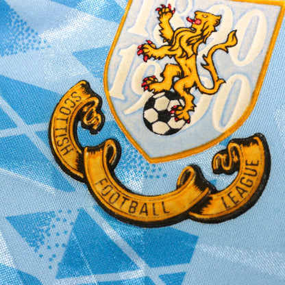 Detail of the centenary crest with lion rampant and 1890-1990 dates