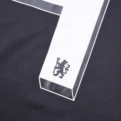 Close-up of number 4 and Chelsea crest print on sleeve