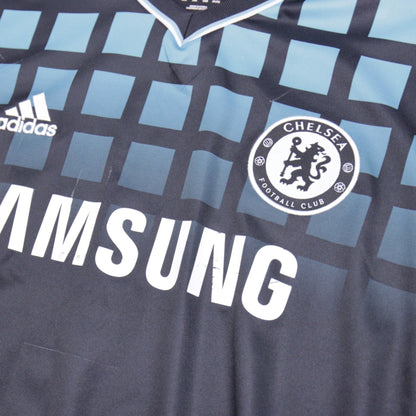 Close-up of adidas logo, Chelsea crest and Samsung sponsor on the front