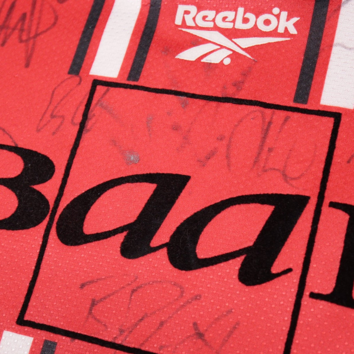 Close-up of the Reebok logo and BaaN sponsor print on the Hannover 96 shirt