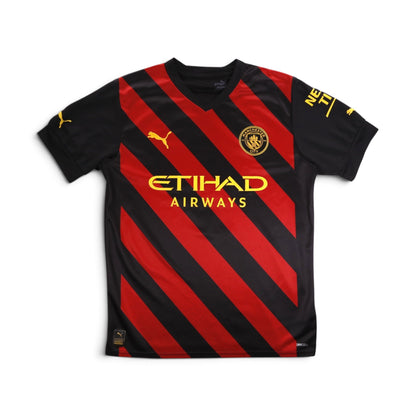 Front of the 2022/23 Manchester City Puma away shirt with Etihad Airways sponsor