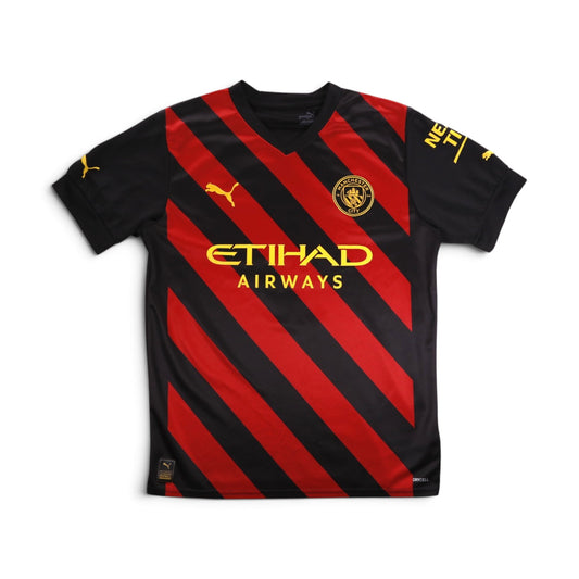Front of the 2022/23 Manchester City Puma away shirt with Etihad Airways sponsor