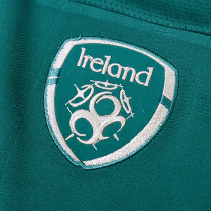 Close-up of the embroidered Ireland crest on the chest of the home shirt