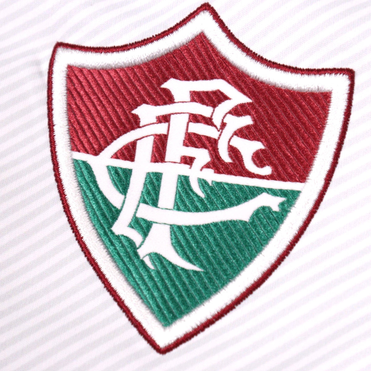 Close-up detail of the embroidered Fluminense crest