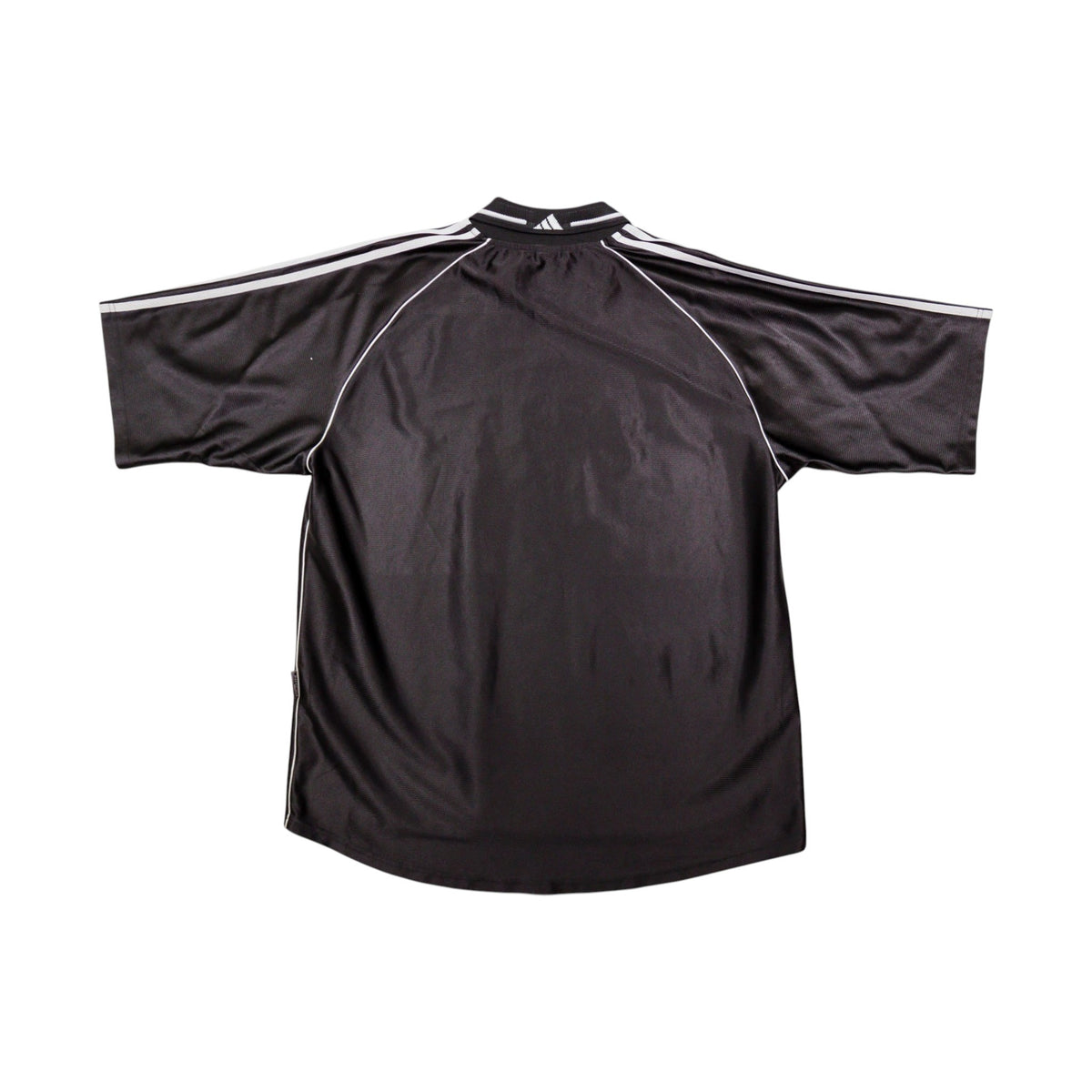 Back of black Preußen Münster away shirt showing plain body and white sleeve stripes