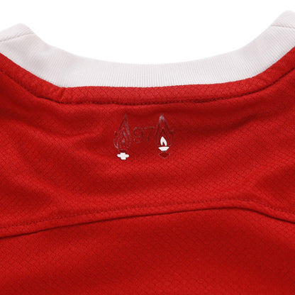 Close-up of commemorative 97 flames detail below the back collar