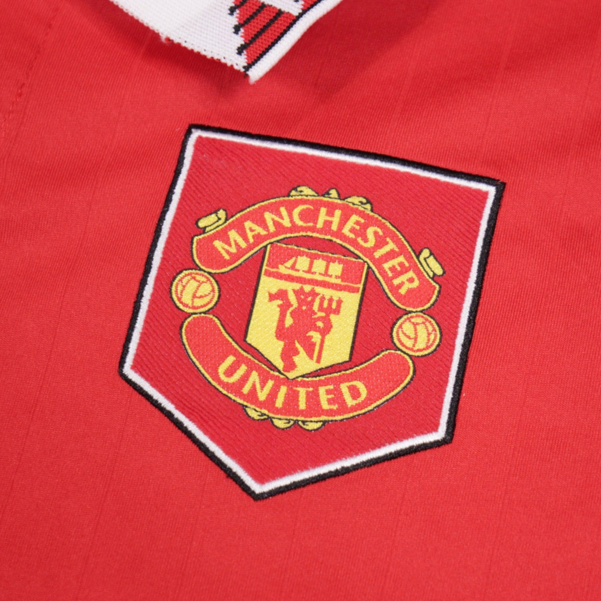 Close-up of the Manchester United crest on the shirt