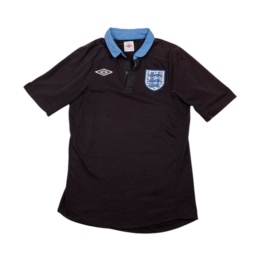 Front view of a 2011/12 England away shirt by Umbro, black with sky blue collar
